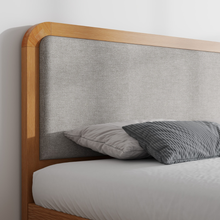 Stanhope wooden ottoman bed, greige upholstered headboard close-up