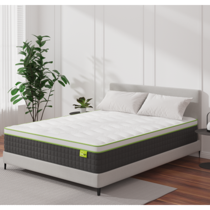 Hermes mattress on bed frame, white top with green border, dark gray cover