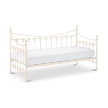 White metal day bed with arched side rails, spindle details, and a smooth upholstered mattress
