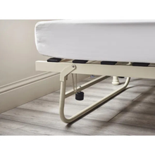 White trundle bed mechanism under the day bed, with slatted support and locking hardware
