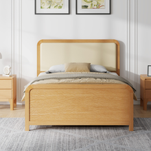 Stanhope wooden ottoman bed with vanilla headboard and light wood front panel