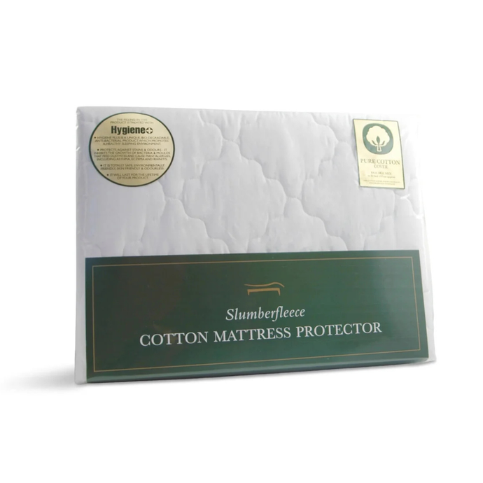 White cotton mattress protector with quilted top surface