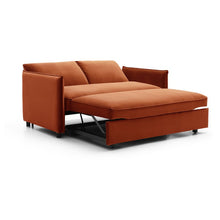 Burnt orange sofa bed pulled out to bed with open frame and cushions