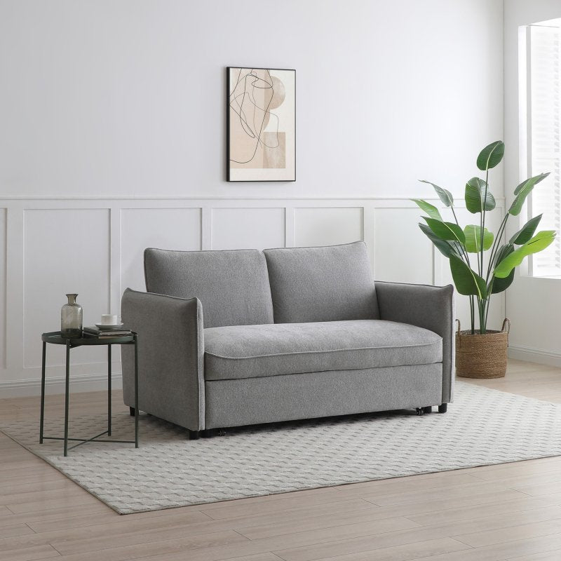 Selma sofa bed in light gray fabric, wide seat with four-cushion back