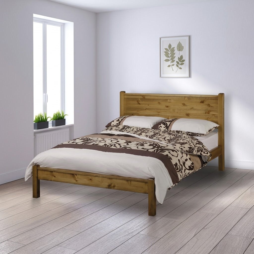 Oak-toned wooden bedstead with slatted headboard and matching footboard, rectangular frame