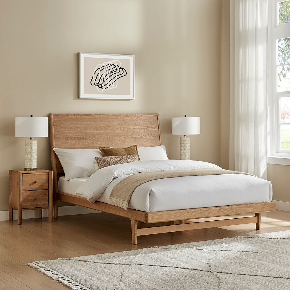 Rosalie bedframe with light wood headboard, slatted base, and tapered legs