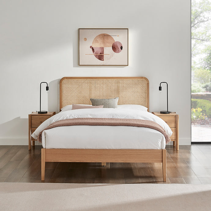 Livia bedframe with woven cane rattan headboard and light wood frame, platform base