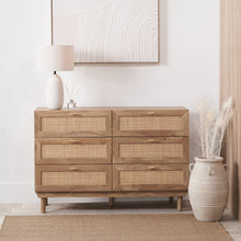 6-drawer chest with woven rattan fronts, light wood frame, and slim metal bar pulls