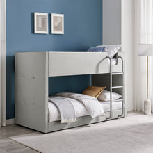 Meadow bunk bed with light gray side panels, ladder, and two sleeping platforms.