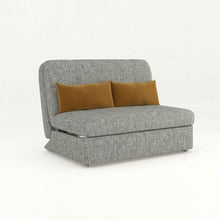Light gray sofa bed with two tan throw pillows and clean-lined sleeper seat