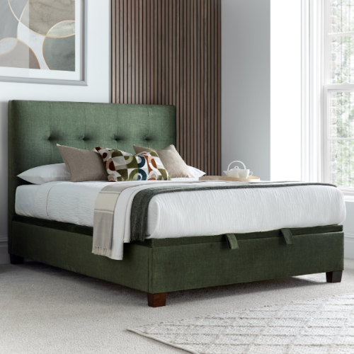 Moss green upholstered ottoman bed with tufted headboard and low profile frame