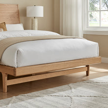 Rosalie bedframe with light wood frame, slatted base, and angled foot design