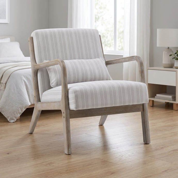 Washed finish wooden armchair with light striped upholstery, cushioned seat and back.