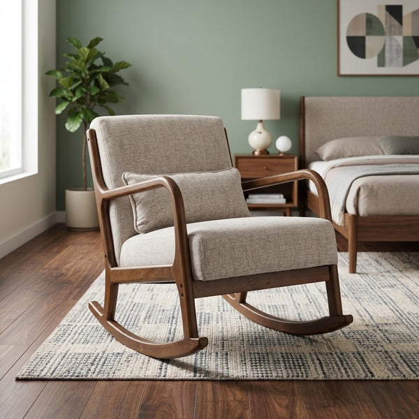 Modern rocking chair with light beige fabric seat, wooden arms, and curved rockers