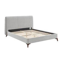 Grey upholstered bedstead with slatted base, side skirt, and tapered wooden legs