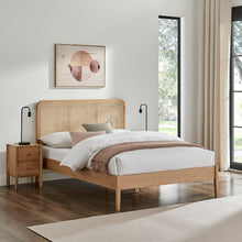 Livia bedframe with rounded woven rattan headboard, light wood posts, platform base