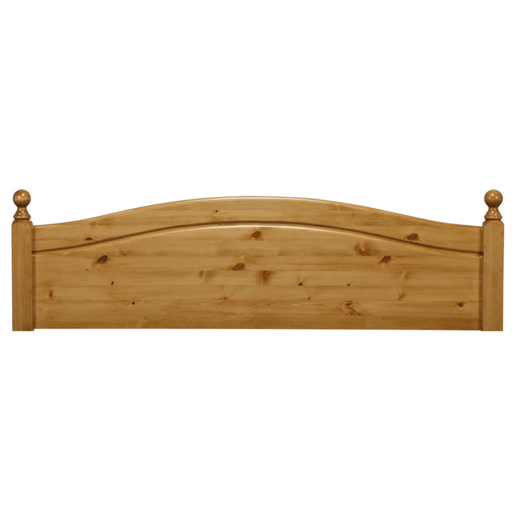 Wooden arched headboard with turned posts, natural finish