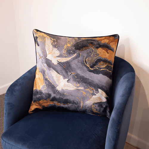 Grey square cushion with gold and white crane and cloud pattern