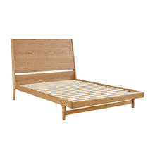 Rosalie bedframe with light wood frame, slatted platform, and curved headboard