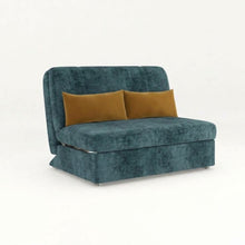 Teal sofa bed with two tan throw pillows and rounded back