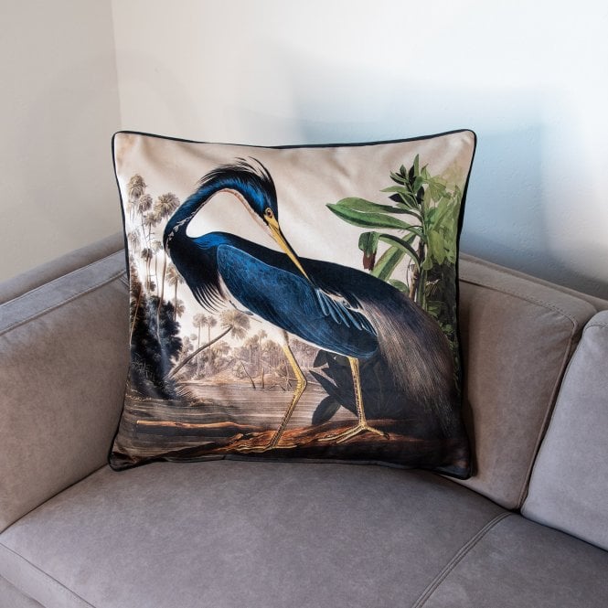 Square cushion cover with blue heron and botanical print, dark piped edge