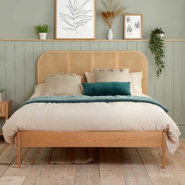 The Reine Rattan bedstead in Oak