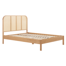 The Reine Rattan bedstead in Oak